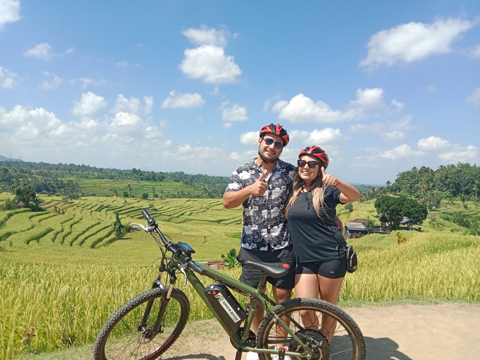 Couple posing in front of rice fields in Jatiluwih